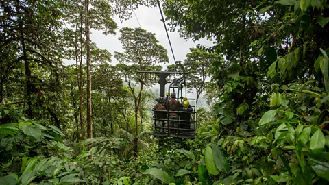 Mashpi Lodge The Dragonfly Canopy Gondola glides through the humid treetops in a cable car on a 2km-long wire (Credit: Mashpi Lodge)