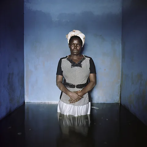 Gideon Mendel Florence Abraham, Igbogene, Bayelsa State, Nigeria, November 2012, from the series Drowning World (Credit: Gideon Mendel)