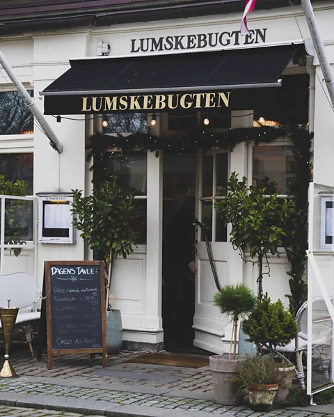 Mellanie Gando-Copenhagen Media Center Lumskebugten is a light-filled and elegant restaurant that serves plenty of classic smørrebrød (Credit: Mellanie Gando-Copenhagen Media Center)