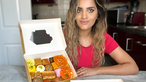 Sanjana Modha and a box of Indian sweets