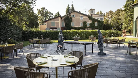 Lido Vannucchi Artwork decorates the courtyard at Casa Maria Luigia (Credit: Lido Vannucchi)