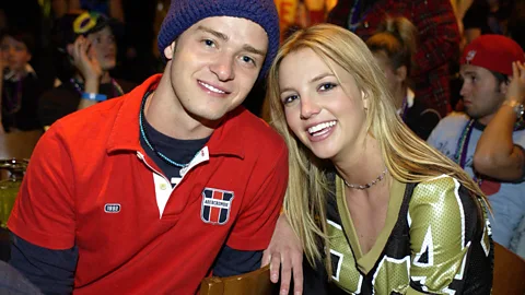 Getty Images Some of the more salacious details from Spears's memoir – such as those about her relationship with Justin Timberlake – made news headlines (Credit: Getty Images)