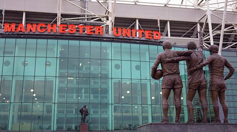 An exterior shot of Old Trafford stadium