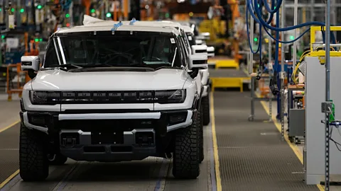 Getty Images Some research shows the electric Hummer emits as much or more greenhouse gas as a standard-sized sedan (Credit: Getty Images)
