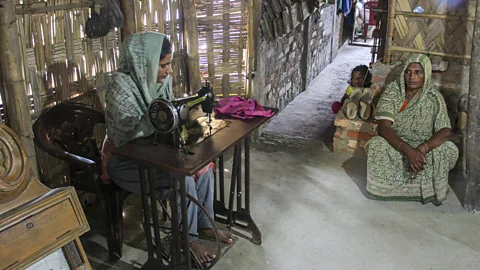 Sadiqur Rahman Umme Sultana, is able to contribute to her family's earnings and pay for her education after receiving a sewing machine from YPSA (Credit: Sadiqur Rahman)