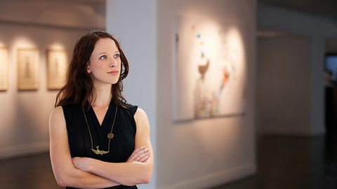 Woman looking at art work