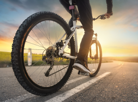 Bike moving down a road