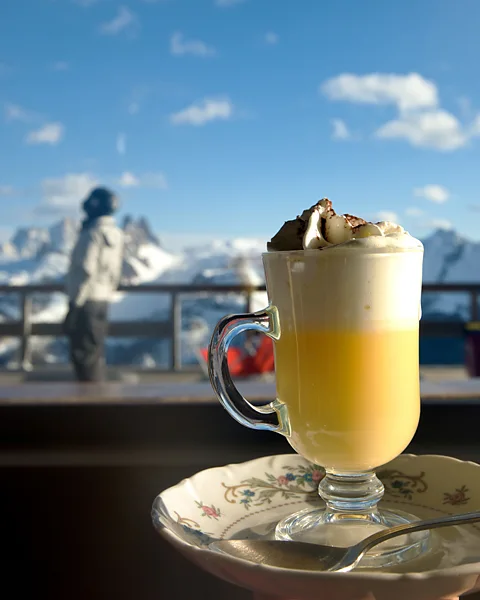 Laurent Fabre/Alamy For many skiers, bombardino is the perfect drink to warm yourself after a day on the slopes (Credit: Laurent Fabre/Alamy)