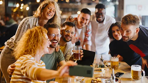 Getty Images Qualities that relate to familiarity, such as approving of a partner's friends, might help us become attracted to someone broadly similar to us (Credit: Getty Images)