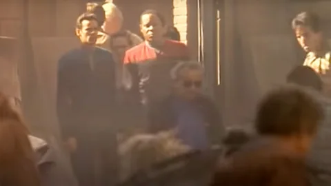Paramount In Past Tense, Sisko and Bashir are escorted to a walled-off section of the city, known as a Sanctuary District (Credit: Paramount)