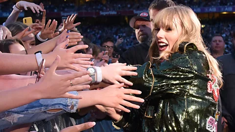 Getty Images Taylor Swift and fans at The Eras Tour