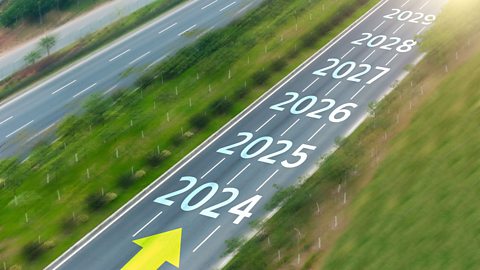 Empty asphalt road with new year numbers.