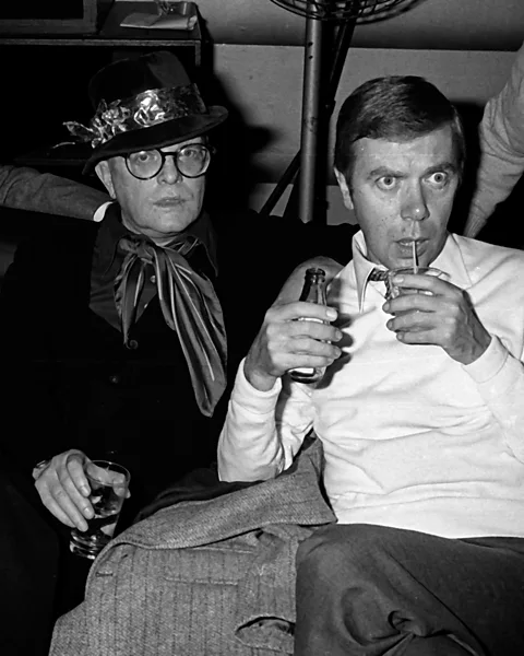 Getty Images Capote and his married lover John O'Shea, who was disliked by the 'Swans' (Credit: Getty Images)