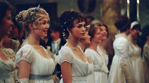 Jane and Elizabeth Bennet at a ball. They are both wearing white dresses.