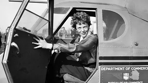 Getty Images Pilot Amelia Earhart poses for a portrait in and aeroplane in circa 1936