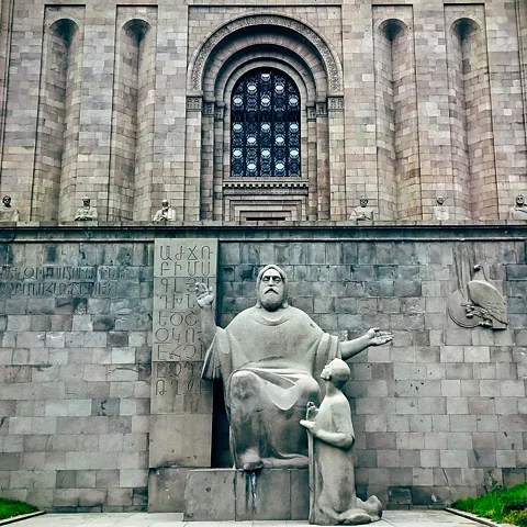 Narek Hovas/Getty Images The statue of Mesrop Mashtots outside Matenadaran shows his importance as the creator of the Armenian alphabet (Credit: Narek Hovas/Getty Images)