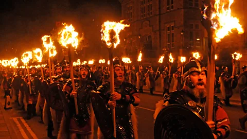 Dave Donaldson/Getty Images Procession of men dressed as Vikings at Up Helly Aa Fire Festival, Shetland