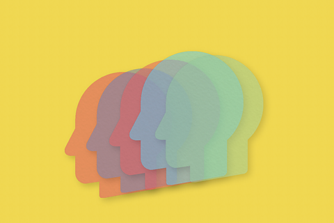 The outline of five semi-transparent heads overlapping one another