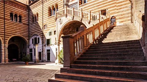 Julian Elliott Photography/Getty Images The Palazzo della Ragione is home to a stunning staircase just perfect for taking romantic, memorable photos (Credit: Julian Elliott Photography/Getty Images)