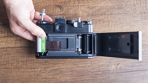 Loading film into an old film analog camera