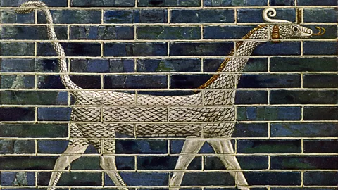 Getty Images A mythological dragon creature called "mušhuššu" in Akkadian, depicted on the Ishtar Gate from Babylon (Credit: Getty Images)