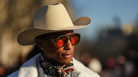 Getty Images Pharrell Williams embraced the cowboy hat in his recent collection for Louis Vuitton (Credit: Getty Images)