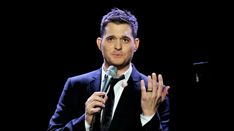 Alamy Several celebrities, including Canadian singer Michael Bublé, have begun wearing men's engagement rings, propelling the trend (Credit: Alamy)