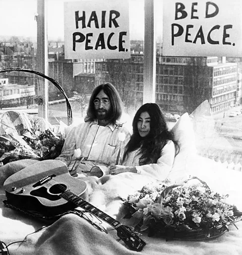 Getty Images Ono collaborated with Lennon on various works and happenings, including the "bed-in for peace" in 1969 (Credit: Getty Images)