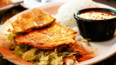 Getty Images La Bomba Puerto Rican restaurant on West Armitage Avenue is Chef Mauro's pick for their El Jibarito sandwich, made with fried plantains and steak (Credit: Getty Images)