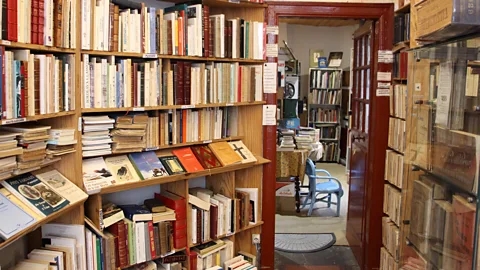 Emily Monaco La Rose des Vents is filled with mountains of old books (Credit: Emily Monaco)