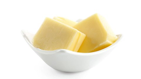 Cubes of butter in a small white dish