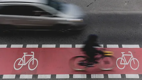 Getty Images In motonormative cultures, pedestrians and cyclists sometimes feel stigmatised on the road (Credit: Getty Images)