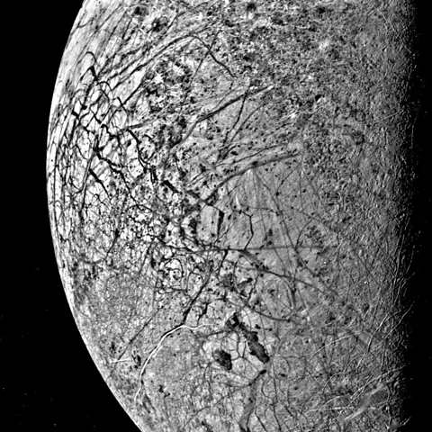 Nasa Two spacecraft are due to visit the icy moon Europa to study the extent of the ocean that exists beneath its fractured surface (Credit: Nasa)