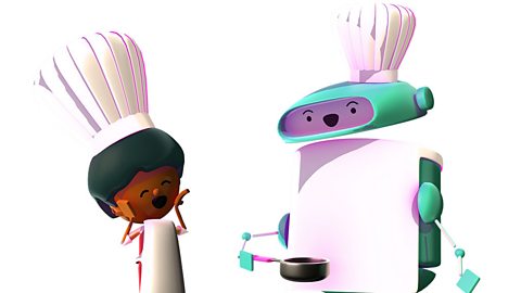 Robot and boy wearing aprons and chefs' hats. Robot is holding a saucepan.