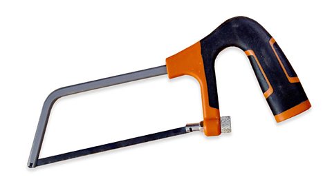 A junior hacksaw on a table