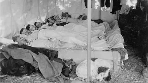 Getty Images Even in the early 20th Century, it was completely normal for people to sleep communally with friends or coworkers (Credit: Getty Images)