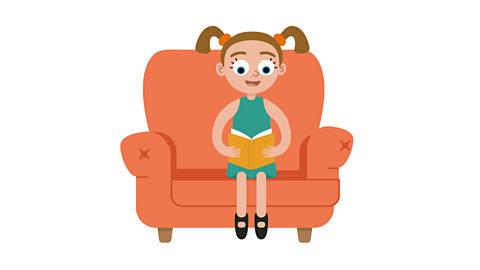 An illustration of a young girl reading in a red armchair.