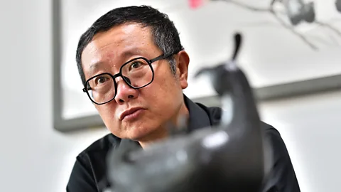 Getty Images Liu Cixin's books have sold more than nine million copies worldwide; fans of The Three Body Problem include Barack Obama and George RR Martin (Credit: Getty Images)