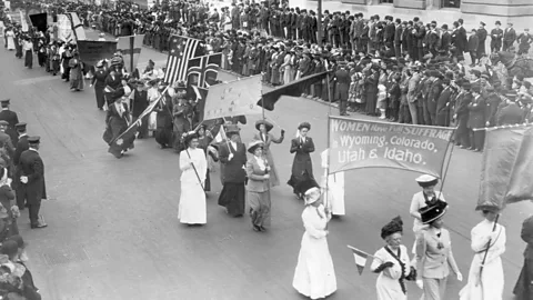 Paul Thompson/Getty Images Before women elsewhere had the right to vote, suffragists marched advertising "Women have full suffrage in Wyoming, Colorado, Utah and Idaho" (Credit: Paul Thompson/Getty Images)