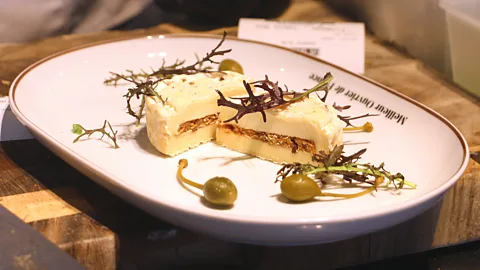 Emily Monaco At the top of the Printemps du Goût department store, Laurent Dubois' cheeses are revisited in a host of culinary preparations such as a goat cheese salad (Credit: Emily Monaco)