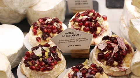 Emily Monaco Taka & Vermo's cheeses can be dessert-like, as with the Sweet Marcellin topped with pistachio halva, sour cherries, pomegranate and mallow flowers (Credit: Emily Monaco)