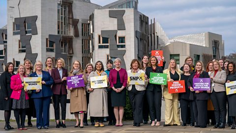 Female MSPs and party members taking part in a photocall to mark International Women's Day, outside the Scottish Parliament, Holyrood, Edinbutgh