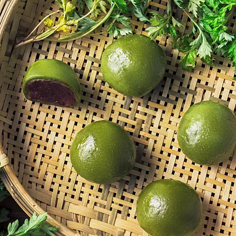 Imaginechina Limited/Alamy Qingtuan dough is emerald-green because of the addition of mugwort, a fragrant herb (Credit: Imaginechina Limited/Alamy)