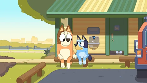 Ludo Studio Bluey's mum Chilli and sister Bingo receive help from returning butterfly  Flappy (Credit: Ludo Studio)