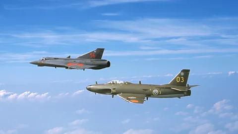 Getty Images Sweden's nuclear weapons would have been delivered by its Lansen (left) and Draken fighters (Credit: Getty Images)