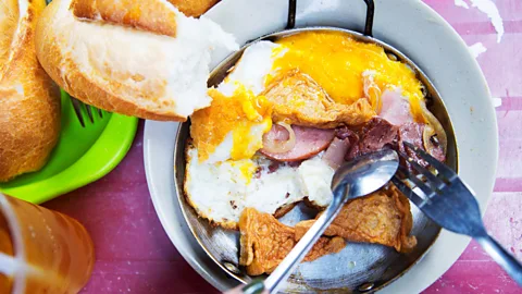 Alamy The fried egg bánh mì is a delicious speciality at Hòa Mã, where the baguette is the star of the show (Credit: Alamy)