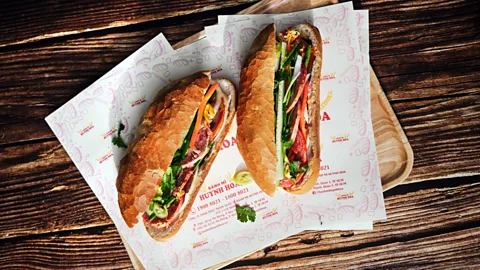 Indigo Freelance Hungry diners line up outside Bánh Mì Huynh Hoa – Huynh Hoa Bread at all hours of the day to score this super popular bánh mi (Credit: Indigo Freelance)