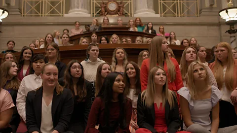 Apple The film shows the first time that boys' and girls' programmes take place on the same campus in the 80-year history of the mock governments (Credit: Apple)