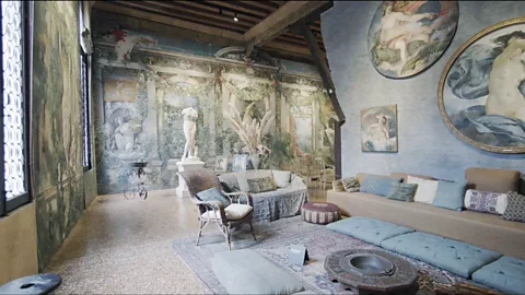 Pomona Pictures Silk brocades and tromp-l'oeil paintings cover the interior walls of Palazzo Fortuny (Credit: Pomona Pictures)