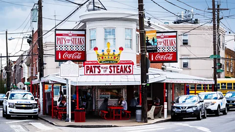 Alamy Philly cheesesteak first-timers owe it to themselves to try a cheesesteak at the OG Pat's King of Steaks at least once (Credit: Alamy )